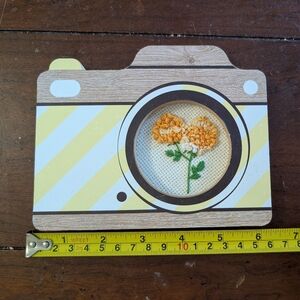 Yellow and White Embroidered Floral Art